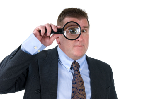 Man with magnifying glass