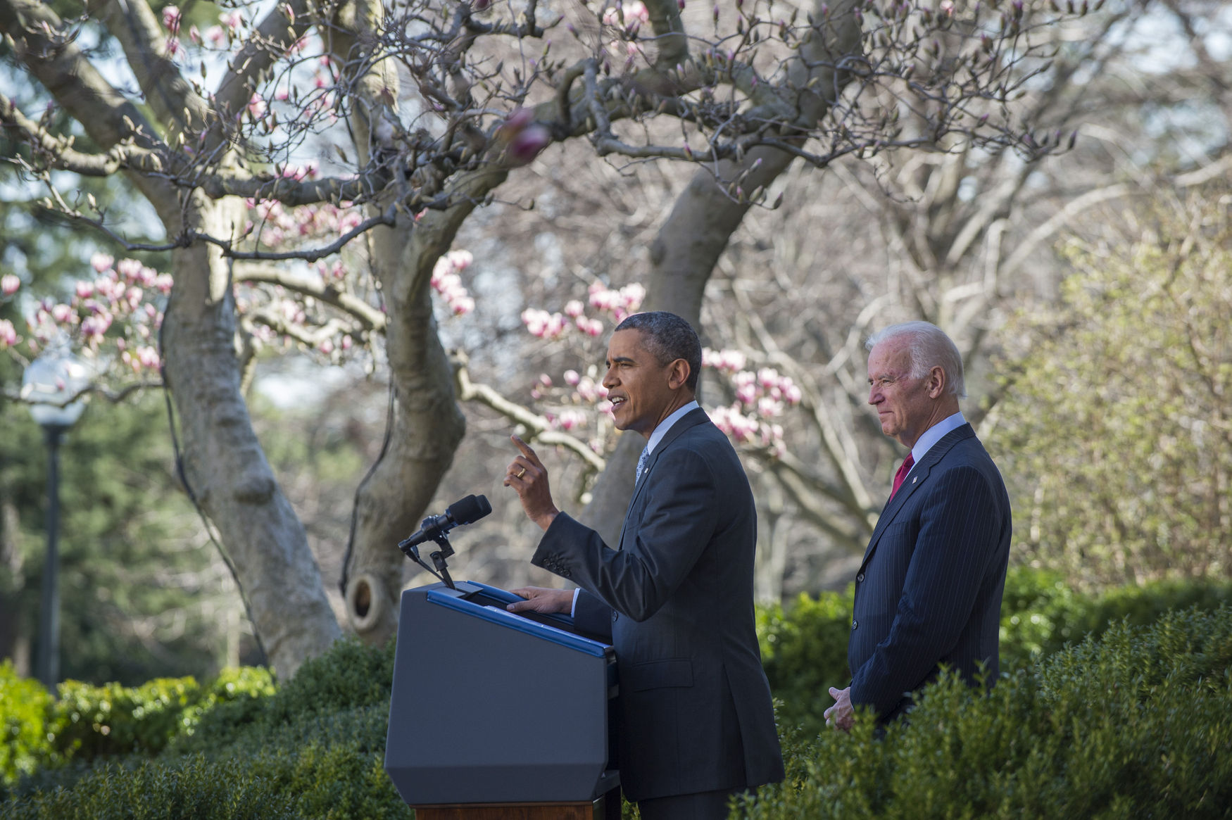 President Barack Obama with Vice-President Joe Biden announces that 7.1 million peoplee have signed up for the Affordable Care Act, in the Rose Garden of the White House