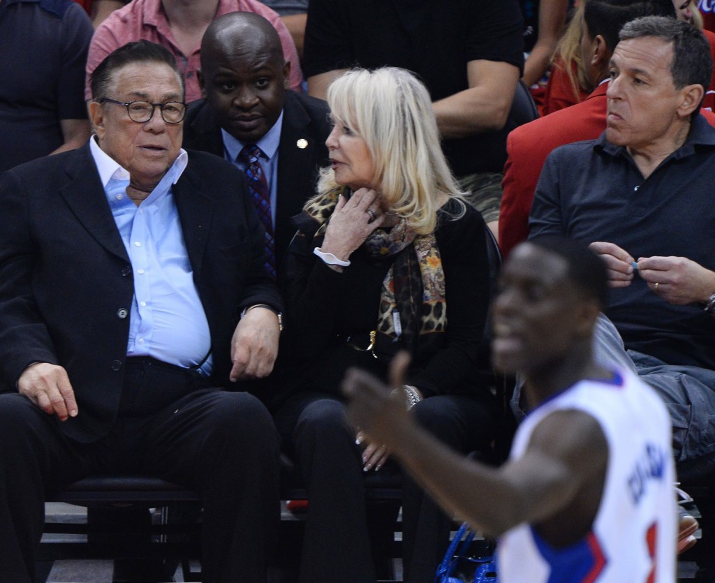 Los Angeles Clippers owner Donald Sterling sits court side with his wife, Rochelle Sterling