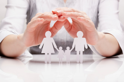 Hands hug the family (concept)