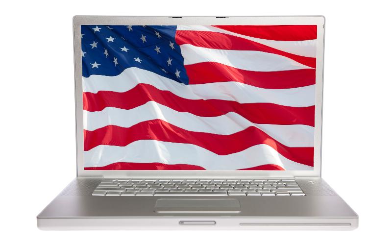 laptop with flag on screen