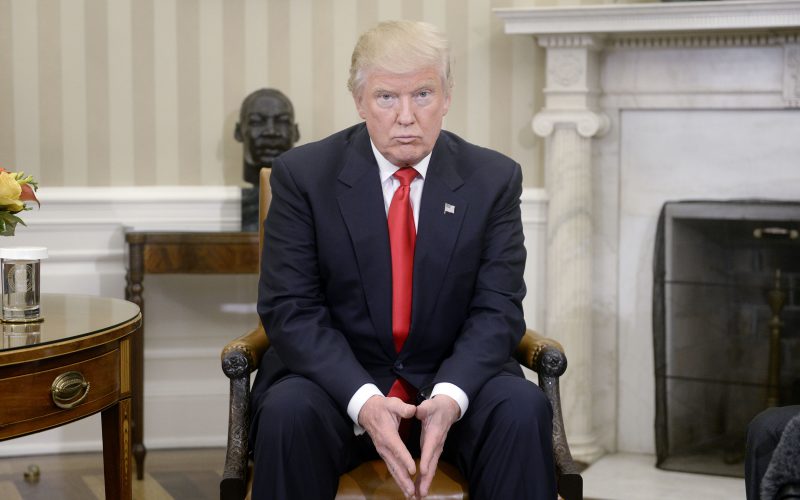 President-elect Donald Trump looks on in the Oval Office of the White House on Thursday, Nov. 10, 2016 during a meeting with U.S. President Barack Obama in their first public step toward a transition of power in Washington, D.C. (Olivier Douliery/Abaca Press/TNS)