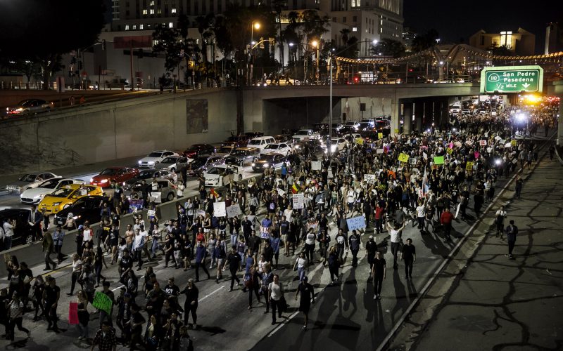 Anti-Trump protesters flood the 101 Freeway as they protest the President-Elect Donald Trump on Nov. 10, 2016 in Los Angeles, Calif. (Marcus Yam/Los Angeles Times/TNS)